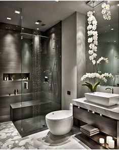 a bathroom with a large tub, sink and shower stall in it's center