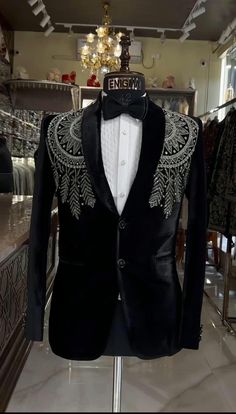 *3 Piece Black Velvet, Shawl Lapel with Silver Embroidery Men'sTuxedo , Groom Tuxedo Suit. *Fabric: %100 Velvet, Cotton, Thick, Warm, Comfortable, Breathable, Softer, Satin Feeling *Center 1 Button Blazer ,With Zipper Fly Pants. *This Suit Has A 6" Drop Which Is The Difference Between The Size Of The Sherwani & Pants. For Example, A 40r Jacket Includes A 34W Pant *Dry Clean Only Important Note: All Our Products Are Made To Order ! Please Contact Us For Perfect Fitting Suit. .Full Lining Tuxedo S Black Slim Fit Long Sleeve Sets, Festive Black Blazer With Suit Collar, Black Embroidered Tuxedo Style Blazer, Black Embroidered Tuxedo Blazer, Tailored Black Embroidered Suits, Black Embroidered Long Sleeve Suit, Black Embroidered Suit For Semi-formal Events, Black Embroidered Suits For Semi-formal Occasions, Tailored Black Embroidered Sets