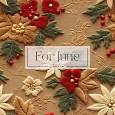 an embroidered fabric with holly and poinsettis is featured in the front cover of for june magazine