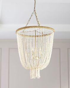 a white chandelier hanging from the ceiling