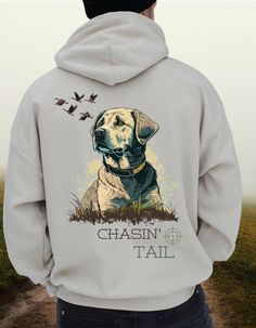 Calling all hunters! Need a hoodie for your next hunt? Look no further. This Men's Chasing Tail Hunting hoodie is the perfect fit for your outdoor adventures. Whether you're duck hunting, bird dogging, or deer hunting, you'll be lookin' sharp in this Labrador Retriever hoodie! Ready, aim, impress! Introducing our Gildan Ultimate Heavy Blend Hoodie for cozy comfort! Being designed for everyday wear, this hoodie is made from a premium 50/50 cotton-polyester blend, enhancing durability, while also staying super comfortable. This cozy  hoodie provides warmth, a soft feel, and long-lasting comfort and durability.      The hood is double-lined with drawstrings for added warmth and an adjustable fit. Its double-needle stitching on the cuffs and waistband provides extra durability, while the spaci Hunting Hoodies, Hunting Quotes, Duck Calls, Bird Dog, Bird Hunting, Hunting Gifts, Gifts For Hunters, Bird Dogs, Hunting Season