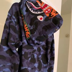 Bape Blue Camo Tiger Shark Wide Full Zip Double Hood Hoodie Large - New W Tags Brand Nw With Tags And Bag. Size Is Large ( Please Remember Japan Sizes Are Smaller Than Us Size) See Measurements Measurements Are 44" Around Chest And 26" Long From Top Of Shoulder To Bottom Of Hoodie Features Heavyweight Double Hood, See Photos Full Zip Jacket Syle Hoodie ( Two Zippers, One On The Bottom And One On The Top) White Jordan Hoodie, Blue Bape Hoodie, Bape Shark, Bape Hoodie, Tiger Hoodie, Nike Pullover Hoodie, Shark Hoodie, Maroon Hoodie, Usa Sweatshirt