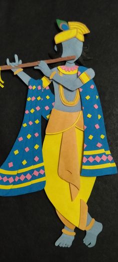 Paper krishna by mesmerize craft Paper Krishna Craft, Krishna Activities For Kids, Krishna Janmashtami Board Decoration Creative, Wall Decoration Ideas For Janmashtami, Krishna Art And Craft, Krishna Paper Craft, Krishna Janmashtami Art And Craft, Krishna Diy Craft, Janmashtami Soft Board Decoration