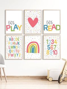 four children's wall art prints with colorful letters and numbers, including a heart, rainbow