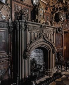 an ornate fireplace in the middle of a room