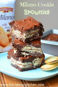 three brownies stacked on top of each other in front of a bag of cookies