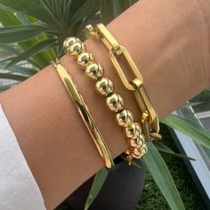 Trendy Gold Beaded Bracelets, Chic Gold Beaded Bangle Bracelet, Trendy Gold Paperclip Bangle Bracelet, Trendy Stackable Gold Bangle, Trendy Gold Stackable Bangle, Gold Dainty Beaded Bracelets, Trendy Gold Metal Beaded Bracelets, Dainty Gold Beaded Metal Bracelets, Trendy Stackable Gold-plated Bracelets