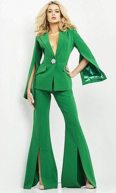 Be ready to fascinate everyone in this couture by Jovani 06922. This formal two piece jumpsuit features slit long sleeves and a collared V neckline. Pants is in full length and also has slit on both sides. Another great creation by Jovani. Model is wearing Emerald color. Style: jovani_06922 Details: Long sleeves, Plunging neckline, Two piece jumpsuit, Slit sleeves, Slit pants, Full length Length: Long Neckline: Deep V Neck Waistline: Natural Silhouette: Jumpsuit Please refer to our returns and e Formal Two Piece, Emerald Green Prom Dress, Prom Dresses Yellow, White Bridesmaid Dresses, Emerald Green Dresses, Purple Bridesmaid Dresses, Grey Bridesmaid Dresses, Purple Prom Dress, Two Piece Jumpsuit