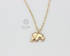 ABOUT PRODUCT  This 14K Gold Elephant Necklace is suitable gift for girlfriend, mom and her. You can even buy as a birthday gift for your friends or anniversary gifts, If you want to add a special note we can write for you and put to inside of package. We manufacture our jewelry pieces with carefully and after production we double checking in quality control department. Our main idea is keep our items for daily wearing especially for minimalist jewelry pieces. 14K Gold Elephant Necklace, Tiny El Cute Yellow Gold Jewelry Gift, Cute Yellow Gold Necklace For Gift, Handmade 14k Gold Jewelry For Birthday, 14k Gold Charm Necklace For Mother's Day Birthday, 14k Gold Charm Necklace For Birthday And Mother's Day, Elephant Necklace Gold, Baby Elefant, Elephant Pendant Necklace, Elephant Ring