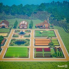 an aerial view of a farm with lots of trees and bushes in the foreground