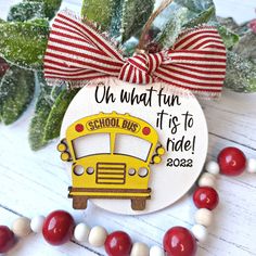 a school bus ornament hanging from a christmas tree