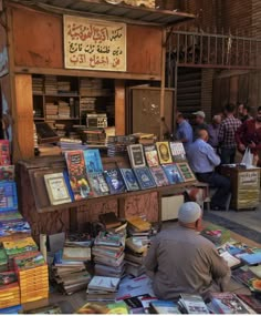 people browse books at an outdoor book market