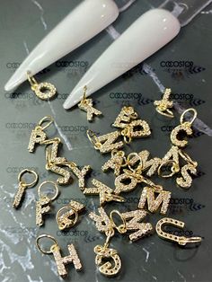 26pcs A-Z diamonds Zircon Nail Letters dangling Nail Charms 3D 💎 26pcs/pack (entire Alphabet) 💎 Material: metal alloy 💎 Colors : Gold 💎 It comes with pierces as shown 💖Please check out another dangling letters here: https://www.etsy.com/CocoStop/listing/1208461123/26pcs-a-z-rhinestone-nail-letters? 💖High quality and Easy Used: Garment, Nail Art, Shoes, Cell Phone, Box, Pen, greeting cards....etc 💖Many styles of rhinestone charms nail art accessories are available in shop .Please check out Nail Dangle Charms, Dangling Nail Charms, Letter Charms On Nails, Nails With Hanging Charms, Nails With Dangle Charms, Cosmetology Kit, Letter Nails, Nail Polish Gift Set, Art Shoes