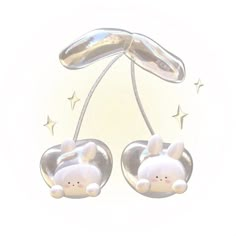 two little bunnies hanging from a string with stars around them on a white background