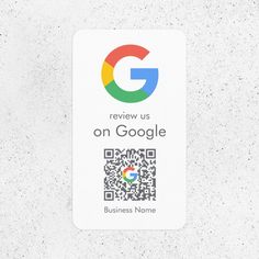 a white business card with the google logo on it