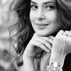 black and white photograph of a woman with bracelets