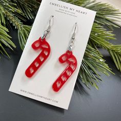 Red Candy Cane Acrylic Dangle Earrings are a must-have for anyone who appreciates exclusive jewelry and loves to strut their own style! Each earring is a petite 2 x 1 inch—super lightweight—so you won't even feel 'em! Need a gift? These are purr-fect! (Plus, you could always treat yourself too.) Fun Jewelry, Red Candy, Own Style, Exclusive Jewelry, Perfect Gift For Her, Treat Yourself, Candy Cane, Amazing Jewelry, The Struts