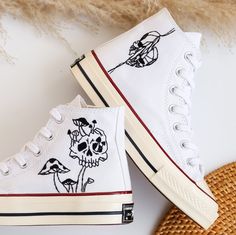 '' Custom White Converse Hight Tops Chuck Taylor 1970s Embroidered Mushrooms and Ghost and Skull, Gothic Embroidered Sneaker Custom, Gift for Him  '' 🍀 Price includes Converse Shoes and Floral Embroidery Designs as shown 🍀 🍀 Shoe Type: Converse 1970s 🍀 Shoe color: 1. White_1970s 1. DETAILS 🍀 You can send me your Converse, Vans, canvas shoes or I can buy them for you. Custom-ordered embroidered Vans and Converse shoes, please wait another 2-4 days. Each pair is hand embroidered to order, please make sure you put in the correct shoe size before you check out. The embroidery is meticulous and does not fade. 🍀 You will receive Vans and Converse shoes with floral embroidery designs as above. 2. PERSONAL EXPRESSION 🍀 Create your unique vibe by your own design of embroidery! In addition to Ghost Converse, Embroidered Converse High Tops, Converse Embroidery, Embroidered Vans, Converse 1970s, Converse Design, Embroidered Converse, Ghost Skull, Custom Converse