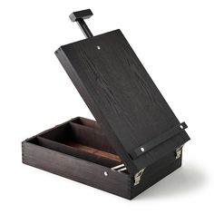 an open wooden box with two compartments