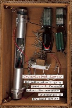 an open box containing several electronic devices and wires, including a radio microphone with the words technological slivery on it