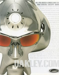 an image of a silver robot with red glasses