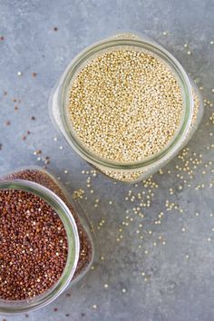 two glass bowls filled with different types of seeds on top of a gray surface next to each other