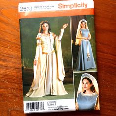 Simplicity 2573 Renaissance Gown, Hat, Veil Costume Pattern Misses Medieval Renaissance Costume Pattern To Make Two Styles Of Gowns With Under Dress, Hat, Veil And Belt Discontinued Simplicity Pattern Un Cut - Factory Folded - Instructions Included New In Original Package Clean - No Rips Tears Or Stains Costume Pattern For Making Princess Renaissance Lady Create Costume For Renn Faire Theatre Halloween Size Ks 8 10 12 14 - 16 Medieval Dresses, Medieval Gown, Simplicity Patterns Dresses, Dresses By Pattern, Costume Sewing Patterns, Pattern Dress Women, Costume Women, Medieval Costume, Costume Patterns