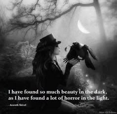 a woman holding a bird in her hand with the caption i have found so much beauty in the dark, as i have found at lot of horror in the light