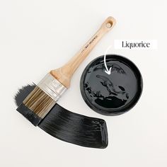 a paint brush and bowl with the words liquiforce written on it next to each other