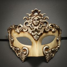 This Greek-Roman Mask Is Made From Paper Molding And Has An Age, Of The White Finish. The Mask Is About 6" Tall And 7" Wide. The Masquerade Mask Will Make A Great Costume Accessory. Made From Plastic With Paper Moldings And Hand-Painted With Off White Finish. Great For A Masquerade Ball Or Venetian Costume Features Mythological Beasts The Mask Is Approximately 6" Tall And 7" Wide Hand-Painted With An Aged Finish Color: Off-White Gold Usm-M31011-Wtsv Elegant White Masks And Prosthetics For Theater, Masquerade Mask Costume, Gold Masquerade Mask, Steampunk Robot, Party Face Masks, Venetian Masquerade Masks, Venice Mask, Venetian Carnival Masks, Steampunk Top Hat