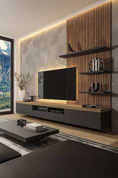 a living room filled with furniture and a flat screen tv on top of a wooden shelf