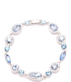 From Givenchy, the Silver and Blue Stone Line Bracelet features:Line bracelet Silver-tone hardware Rhodium/blue, brass, zinc, glassFold-over closure Approx. 7.25", 04" WImported. Silver Blue Jewelry, Blue Diamond Bracelet, Luxury Light Blue Sterling Silver Jewelry, Something Blue Bracelet, Luxury Blue Sterling Silver Bracelets, Luxury Elegant Blue Sterling Silver Bracelet, Blue Jewlery, Luxury Statement Blue Bracelets, Light Blue Bracelet