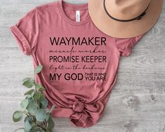 a t - shirt that says,'waymaker never makes the promise keeper right in the heart of my god who is you are