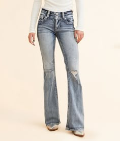 Miss Me Mid-Rise Flare Stretch Jean - Blue 30/30, Women's M819C Mid-rise Slim through the hip and thigh 21 bottom opening Rhinestones and sequins on metallic embroidered faux flap back pockets Pieced comfort waistband Destruction details. This quality denim is hand-finished for a unique look. It will wear like your favorite jeans, with each hole and tear continuing to destruct over time. You will love the comfort of this denim that has the look and feel of years of wear. . 99% Cotton 1% Elastane Jeans With Jewels On Back Pockets, Miss Me Jeans Flared, Womens Jeans Bootcut, Bootcut Jean, Clothing Wishlist, Jeans Bootcut, Womens Jeans, Miss Me Jeans, Dream Clothes