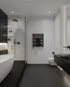 a modern bathroom with black and white decor