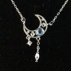 Boutique Item Blue Stone Moon Necklace Boho Unique Exquisite Beautiful Necklace Color Is Silver 925 S Intricate Detail In Moon. Has 2 Hanging Rhinestones Boho Style Moon Stone Necklaces, Moon Necklace Silver, Character Clothing, Moon Blue, Blue Stone Necklace, Stone Necklaces, Pretty Accessories, Moon Setting, Moonstone Necklace