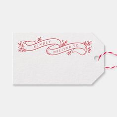 a red and white christmas gift tag with the words kindly deliver to you on it