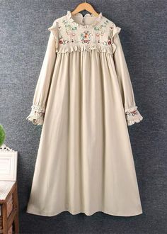 New Khaki Embroidered Ruffled Cotton Long Dresses SpringFabric: Cotton BlendedSize & Fit:Fit: This garment fits true to size.Length: Size L measures 44.85"from shoulder to hemBust: Great for any cup size. Waist: Loose Fit. Comfortable room throughout midsection.Hip: Loose Fit - room for hips.Hand Wash Cold. Long Sleeve Beige Dress With Embroidered Hem, Beige Long Sleeve Dress With Embroidered Hem, Winter Cotton Dress With Embroidery, Winter Embroidered Cotton Dress, Embroidered Beige Fall Dresses, Fall Embroidered Beige Dress, Fall Beige Dresses With Floral Embroidery, Fall Beige Floral Embroidered Dresses, Long Sleeve Embroidered Dress With Ruffles For Summer