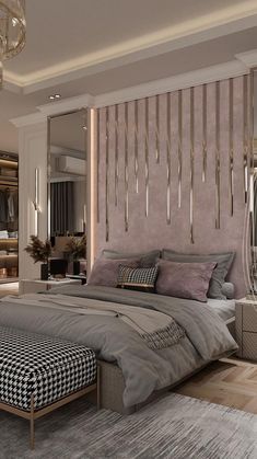 a bedroom with a large bed and mirrored walls