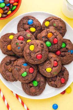 chocolate m & m cookies on a plate with candy