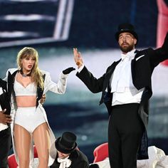 taylor swift and the backs perform on stage at the 2012 american music awards in los angeles