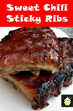 two pieces of barbecue ribs on a white plate with the words sweet chili sticky ribs