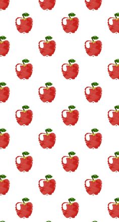 an apple pattern on a white background with red apples and green leaves in the middle