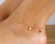 "Dainty Gold Anklet Bracelet, 925 Sterling Silver Star Anklet, Gold Plated Anklet, Gold Chain Anklet, Real Silver Anklets, Boho Anklet Gold plated anklet in 925 sterling silver. Weight Total weight of Product: 6 grams Total weight of Silver: 6 grams Sizes - 7-12 (If you need any other size, feel free to contact me) Materials Used Silver Check out our best exclusive Minimalist Rings for daily wear: https://www.etsy.com/uk/listing/1033128950/ https://www.etsy.com/uk/listing/1029688952/ https://www.etsy.com/uk/listing/1022400989/ https://www.etsy.com/uk/listing/943673398/ https://www.etsy.com/uk/listing/1032113317/ https://www.etsy.com/uk/listing/1008457498/ https://www.etsy.com/uk/listing/1031211439/ Shipping It's free. We have partnered with some of the fastest & most reliable logistics com Gold Anklet With Star Charm As Gift, Gold Anklets With Star Charm For Gift, Star Charm Anklets For Gifts, Star Charm Anklets As Gift, Star Charm Anklets Suitable As A Gift, Rings For Daily Wear, Gold Chain Anklet, Star Anklet, Anklet Gold