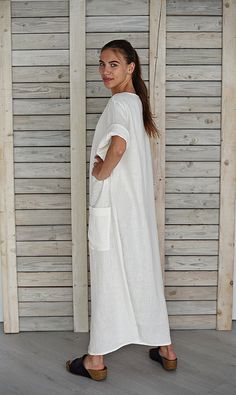 "Linen tunic / Beach dress / Holiday dress / Linen tunic dress / Long white summer dress / Loose linen dress / Maternity dress / Pure white The linen dress is with split and two big pockets in front. You can wear the dress with folded or unfolded sleeves. This elegant natural linen dress will impact the felling of freedom and original style for every women who will wear it. It is cozy, comfortable and soft, made from washed and softened medium weight natural Lithuanian linen. You can choose from Casual White Shift Maxi Dress, Long White Summer Dress, White Long Dress Summer, Natural Linen Dress, Linen Tunic Dress, White Summer Dress, Dress Maternity, Big Pockets, Dress Linen