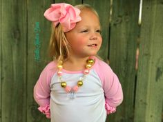 . This Pink & Gold Chunky Bead Bubblegum necklace is sure to make girl that puts it on feel like the princess that she is. Girls love accessories and this one is a "Must Have" as it is just so pretty and sure to give any outfit that "WOW" factor and the smile it gives her when she / you is wearing it helps. This necklace measures 22" long. It does have 2" of an extended chain so that you can change the length if you wish. The clear pendant is 1 1/2" long ****CHOKING HAZARD DISCLAiMER***** Never Playful Pink Beaded Necklaces For Birthday, Playful Pink Beaded Necklaces For Birthdays, Playful Pink Beaded Necklace For Birthday, Cute Pink Flower Necklace, Cute Pink Beaded Necklaces For Birthday, Flower Girl Necklace, Girls Necklace, Bubblegum Necklace, The Smile