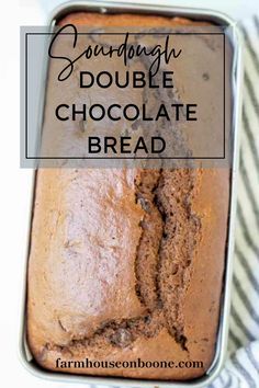 a loaf of sourdough double chocolate bread in a pan with the words, sourdough double chocolate bread