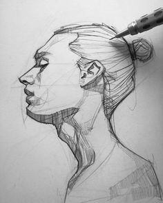 a pencil drawing of a woman's face in profile with her hair pulled back