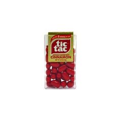 a package of red candies sitting on top of a white table