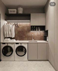 a washer and dryer in a small room